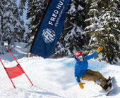 Snowboarder in banked slalom